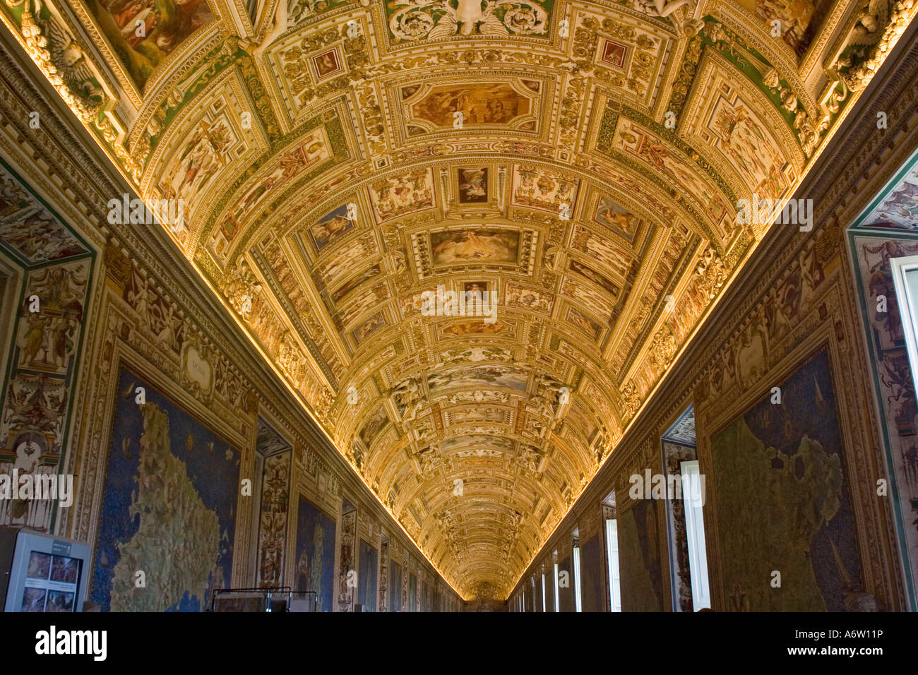 Hallway with magnificent mosaics, wall hangings and paintings at the