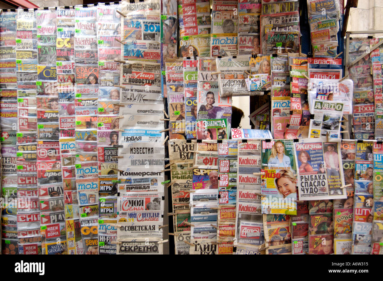 Many magazines and newspapers for sale on a newsagent kiosk in Moscow russia Stock Photo