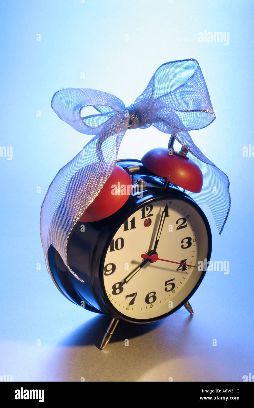 Alarm Clock with Ribbon Stock Photo