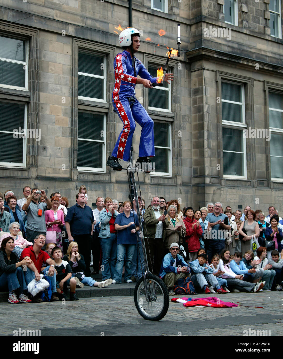 Juggling on a unicycle hires stock photography and images Alamy