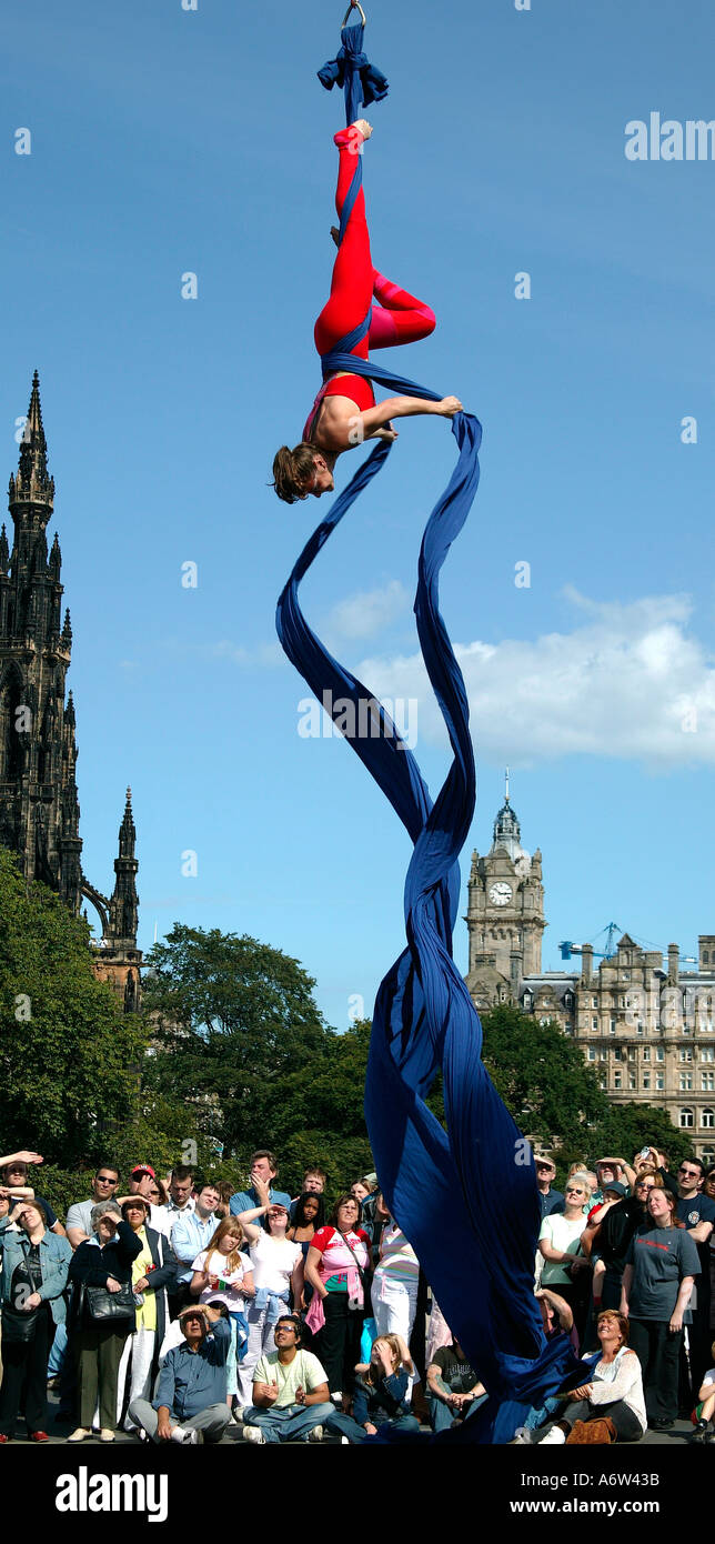 Female trapeze artist performing at the Edinburgh Fringe Festival Scotland UK 2004 Stock Photo
