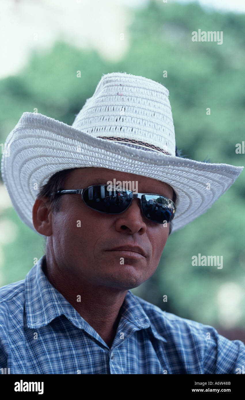 Cuba Havana Cuban man wearing white sombrero hat looking to camera close up Stock Photo