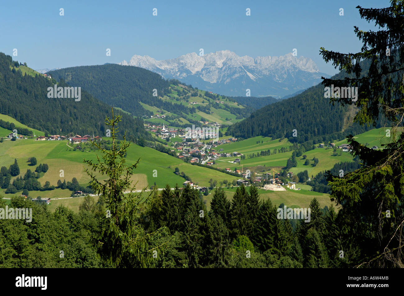 a village in the valley with view of the Alps Stock Photo - Alamy