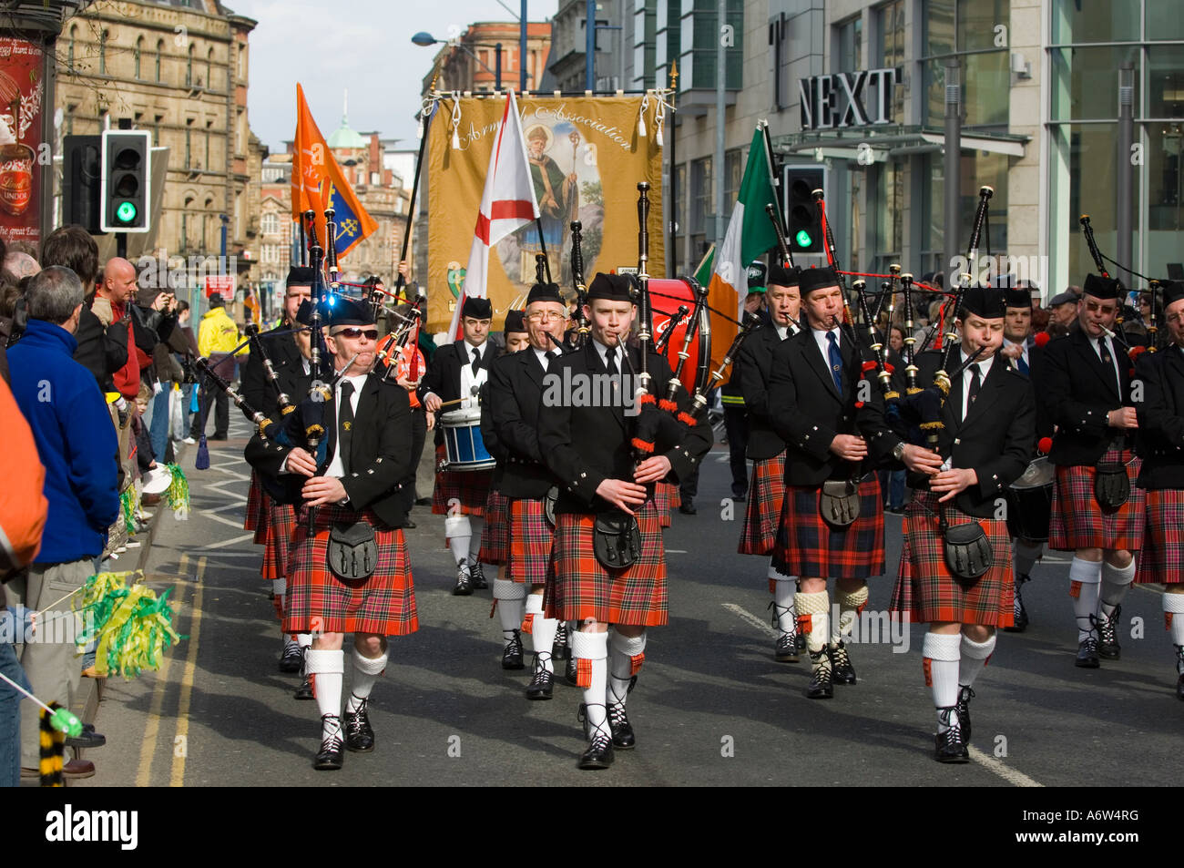 Bagpipe marching band in St.Patrick's day parade Manchester UK Stock