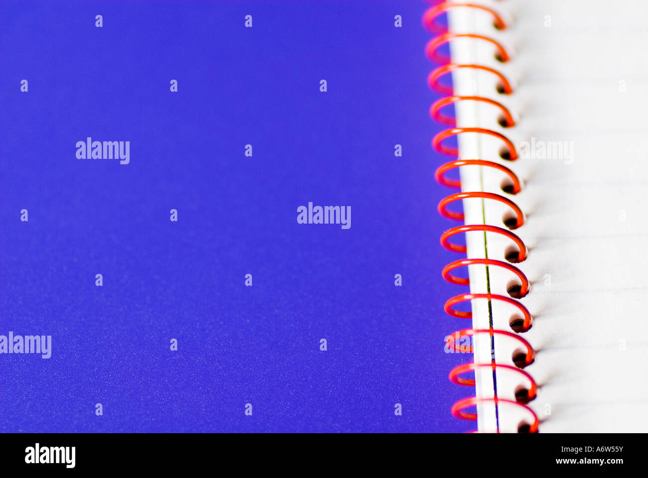 Wire ring bind book on a blue background Stock Photo