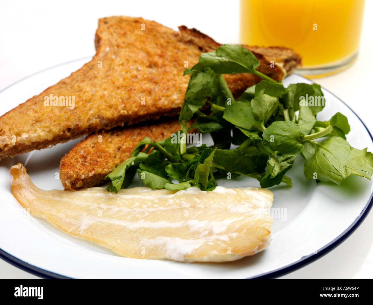 Poached Haddock Fillet Stock Photo Alamy