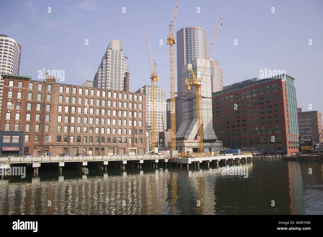Cranes constructing apartment building on top of Big Dig exhaust vents