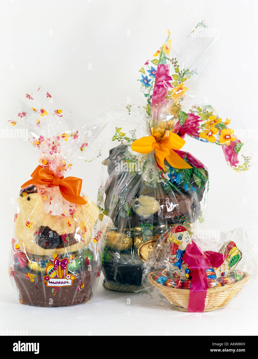 Chocolate Easter Eggs With Chocolate Hens In Baskets & Chocolate Bunny Stock Photo