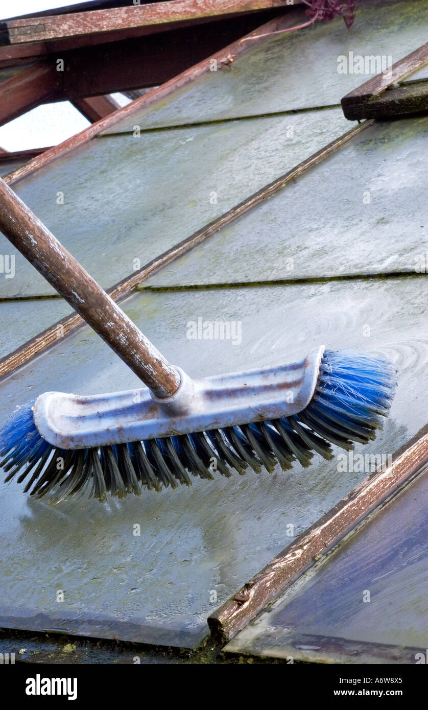 CLEANING GREENHOUSE GLASS Stock Photo Alamy