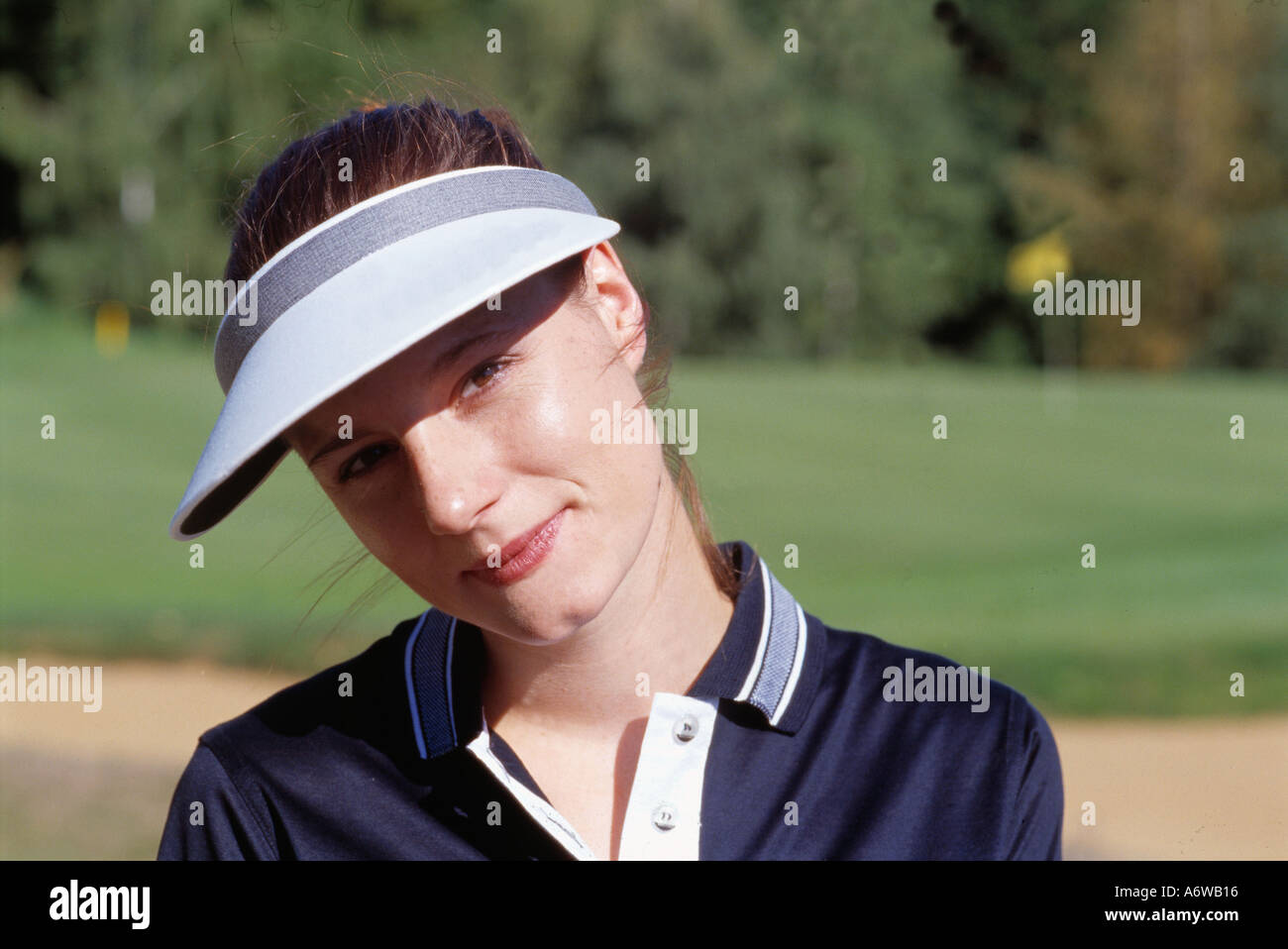 Portrait of young lady golfer Stock Photo