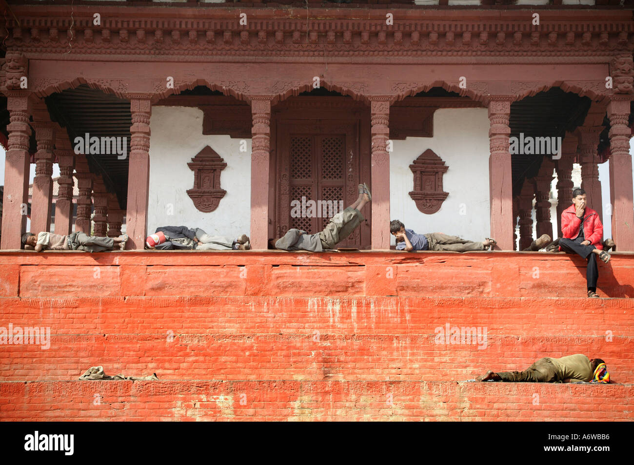 Locals chill out at Kathmandu's Durbar Square Nepal Stock Photo