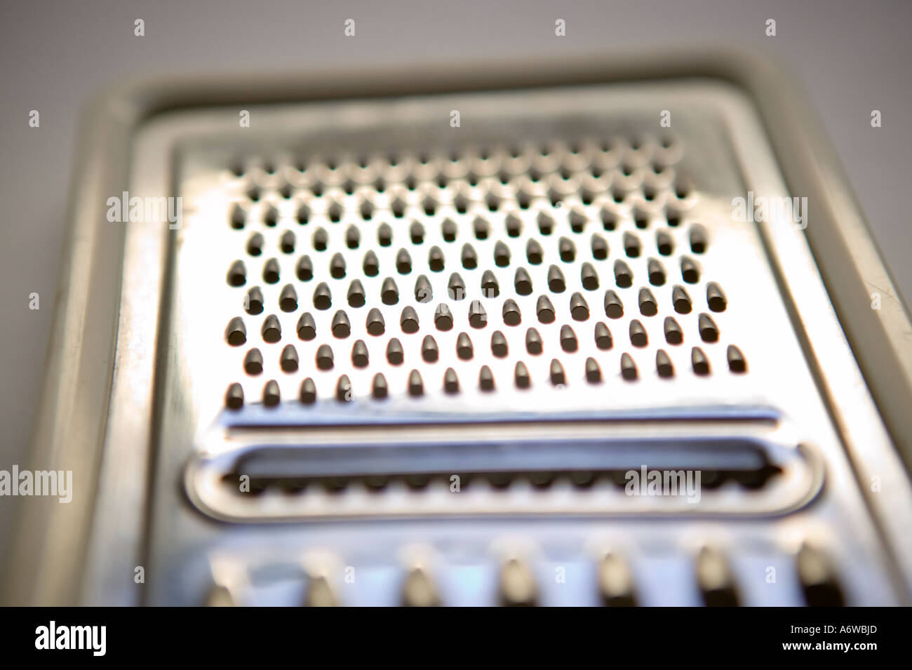 Studio shot of a grating board on a plain white background Stock Photo