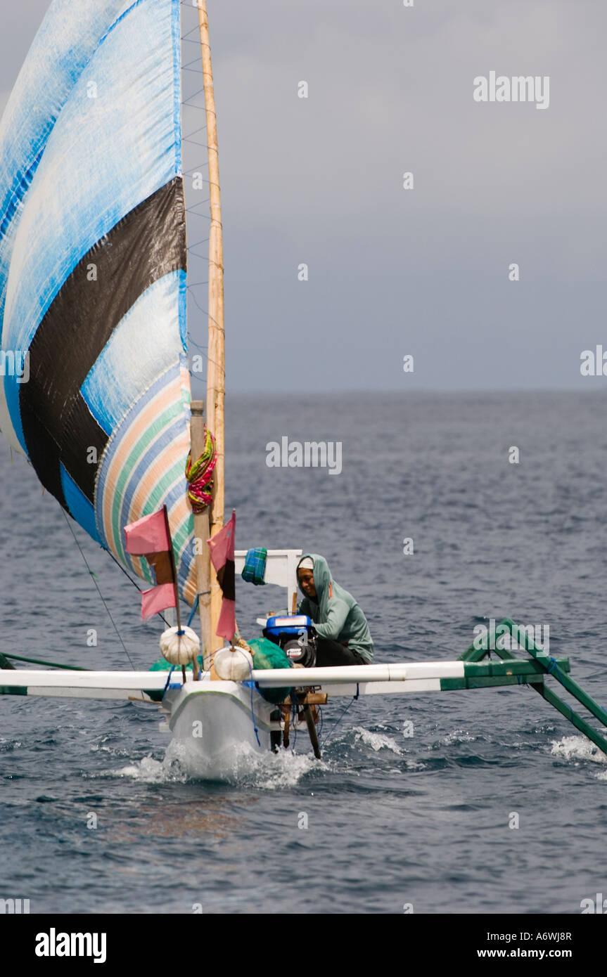 fisherman on fishing boat sailing in the sea Stock Photo - Alamy