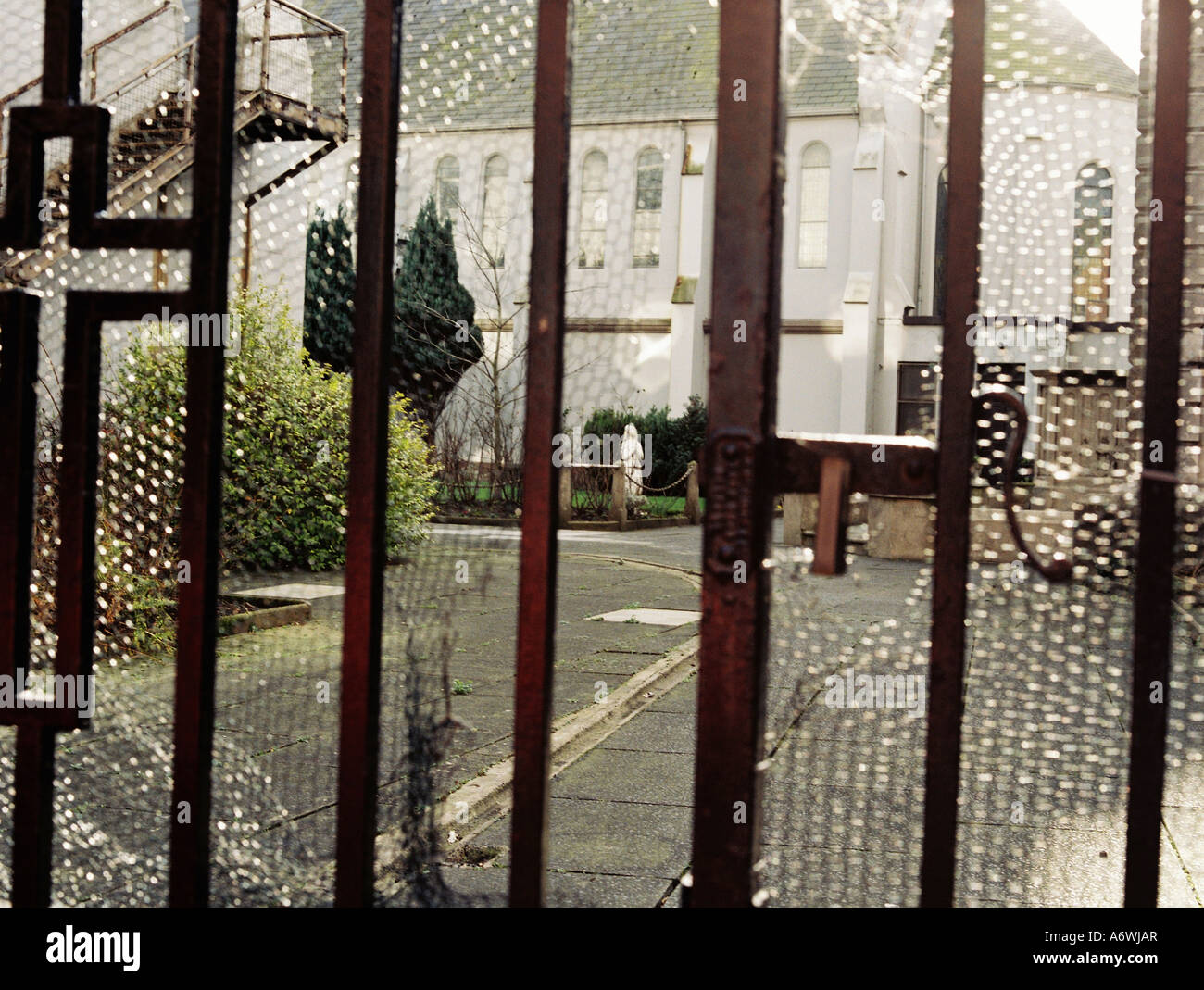 Looking through the gates of a convent in Hammersmith London Stock ...