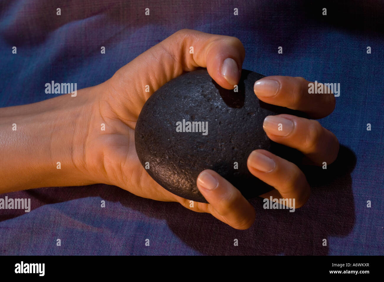 hot rock massage Stock Photo Alamy