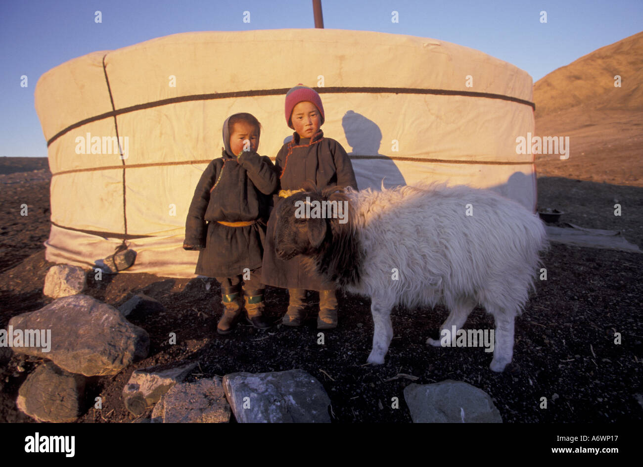 Asia, Mongolia. Nomad children in front of yurt Stock Photo - Alamy