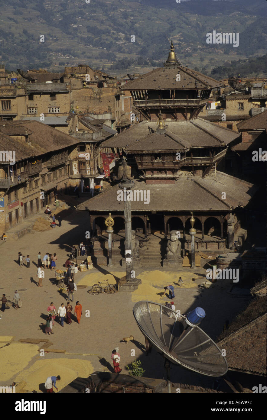 Nepal, Kathmandu Valley, Bhaktapur. Satellite, Dattatraya Temple (1427) and harvested rice, Tachupal Tole Square. Stock Photo