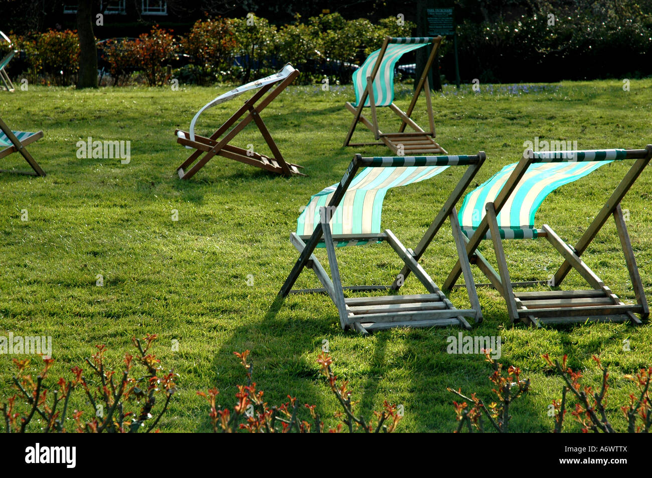 deck chair in the park air sun Stock Photo - Alamy