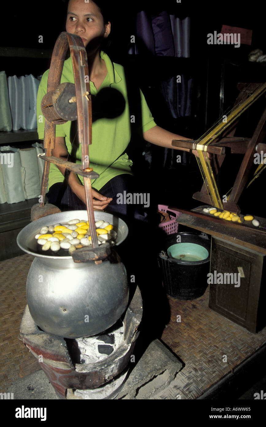 Thailand, Chiang Mai. Spinning silk from cocoons, tourist attraction