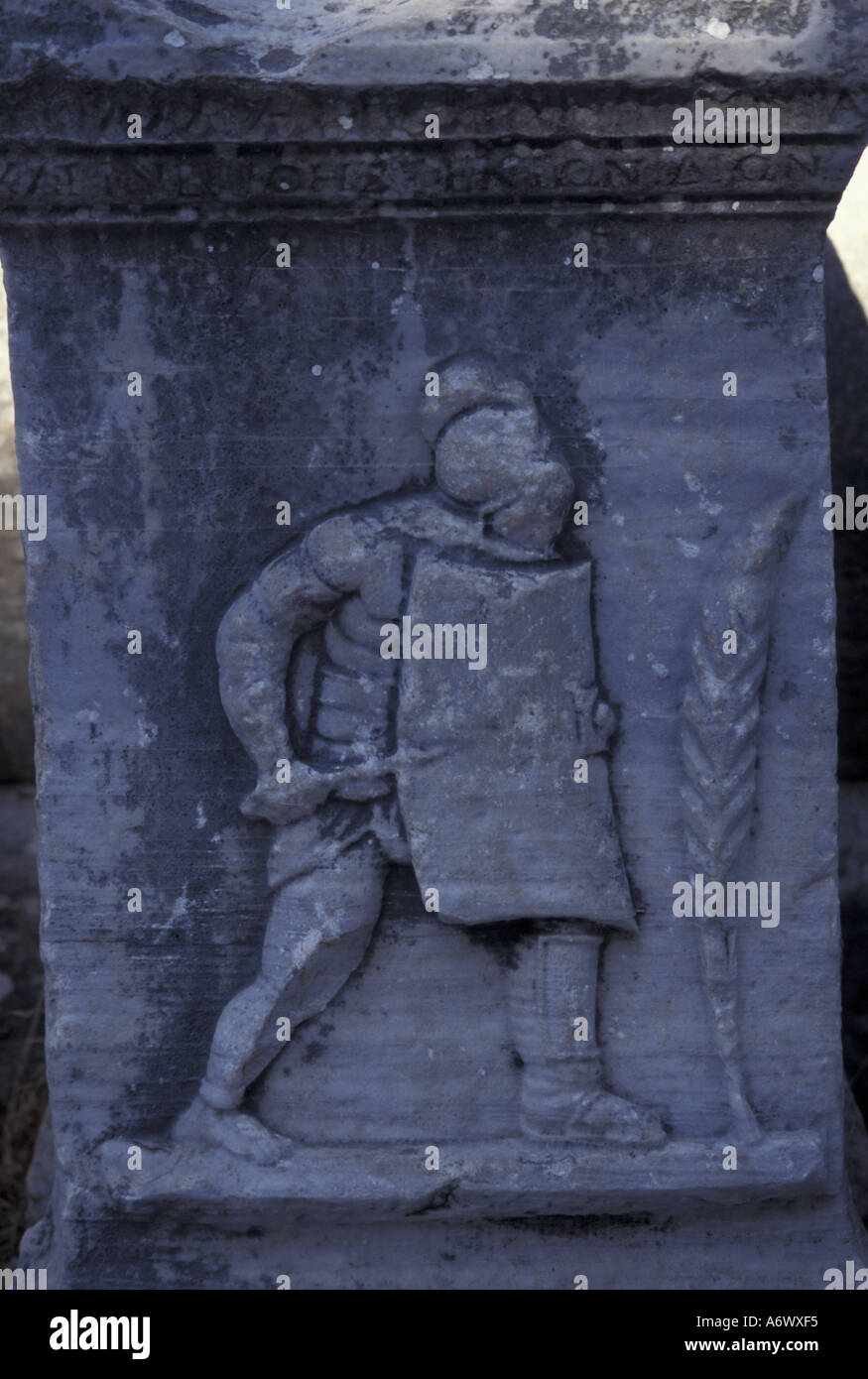 Turkey, Ephesus. The pen is mightier than the sword. A high relief sculpture a stone tablet in the restored city of Ephesus. Stock Photo