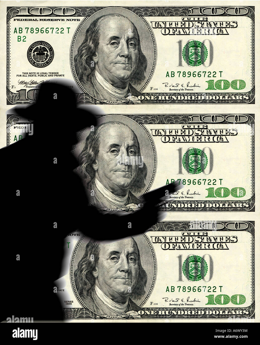 shadow of man with gun composited on US $100 bills background Stock ...