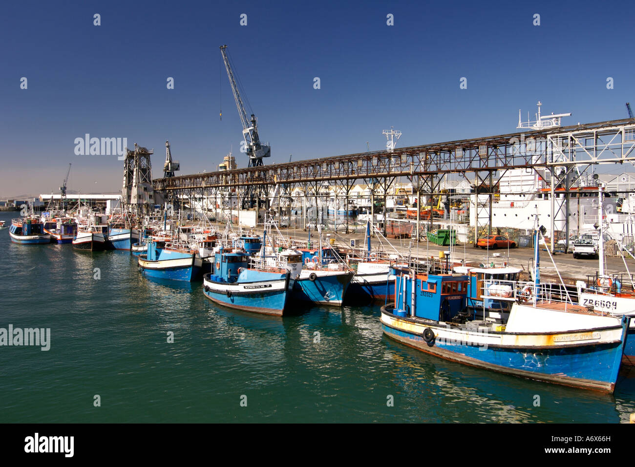Fishing boats moored in the waterfront at the harbour in Cape Town South Africa. Stock Photo