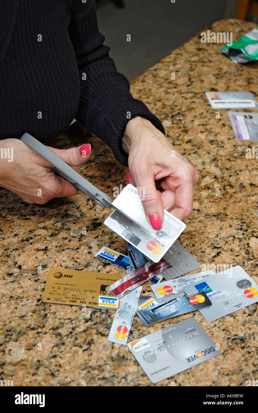 The cutting up of credit cards Stock Photo Alamy