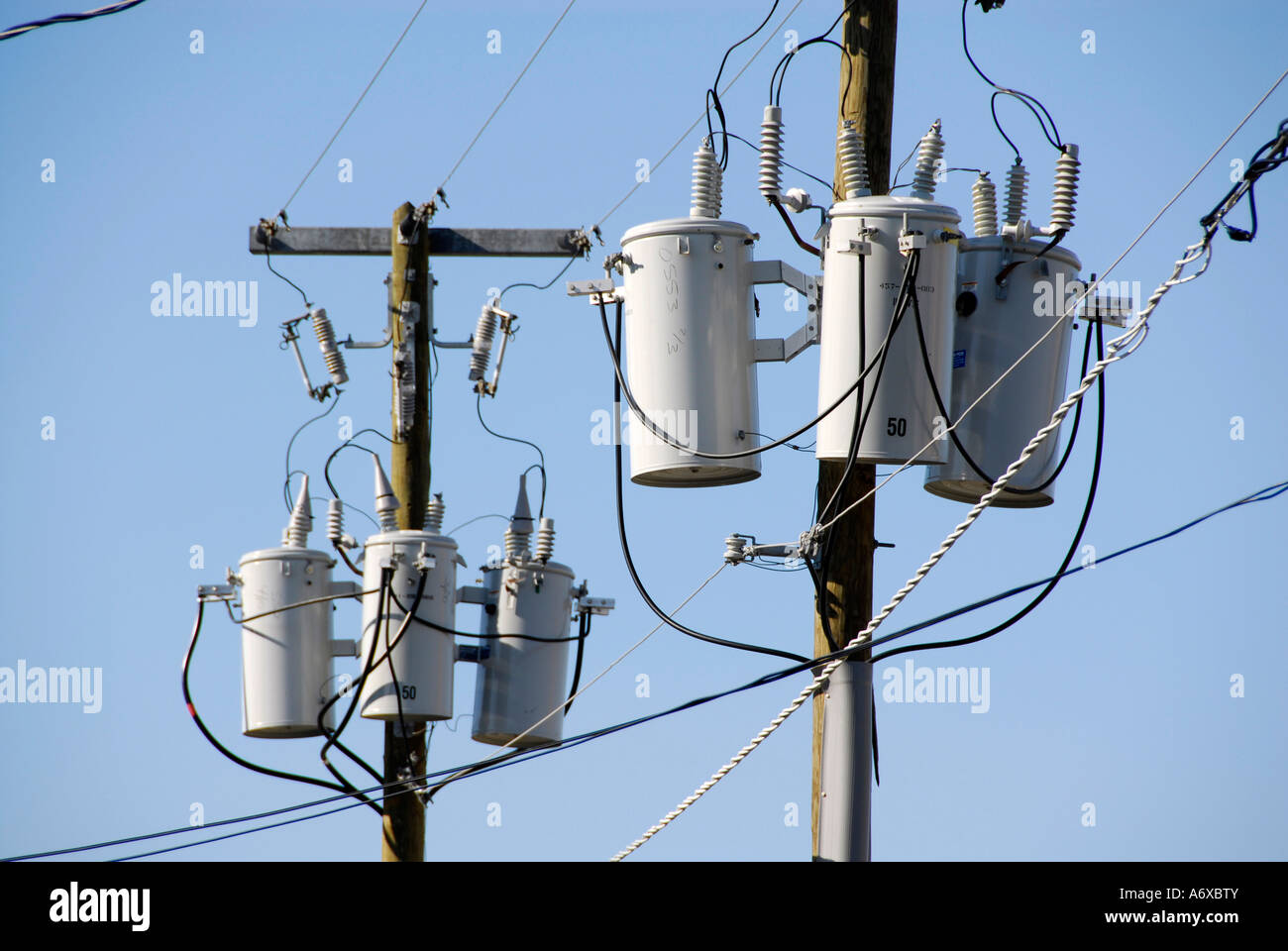 Electrical transformers located on poles in a residential neighborhoods Stock Photo Alamy