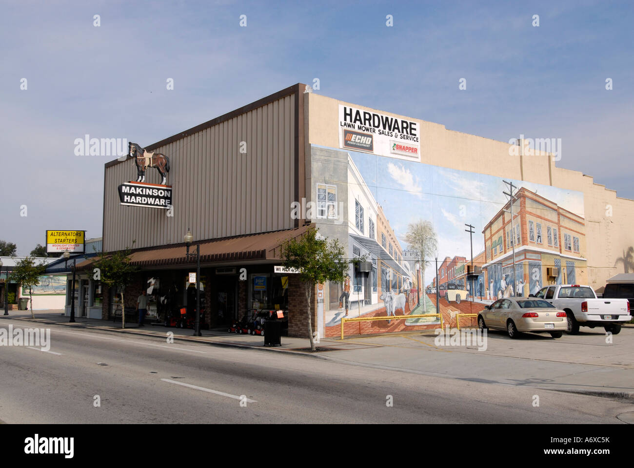 Famous artistic painted murals on buildings in Historic downtown Kissimmee Florida FL Stock Photo