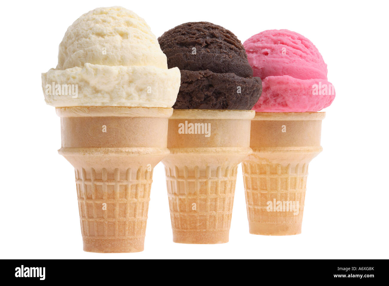 Vanilla Chocolate and Strawberry ice cream cones cut out on white background Stock Photo