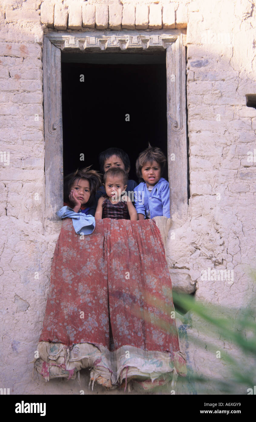 Nepali kids watching through the window in Kathmandu valley Nepal Stock Photo