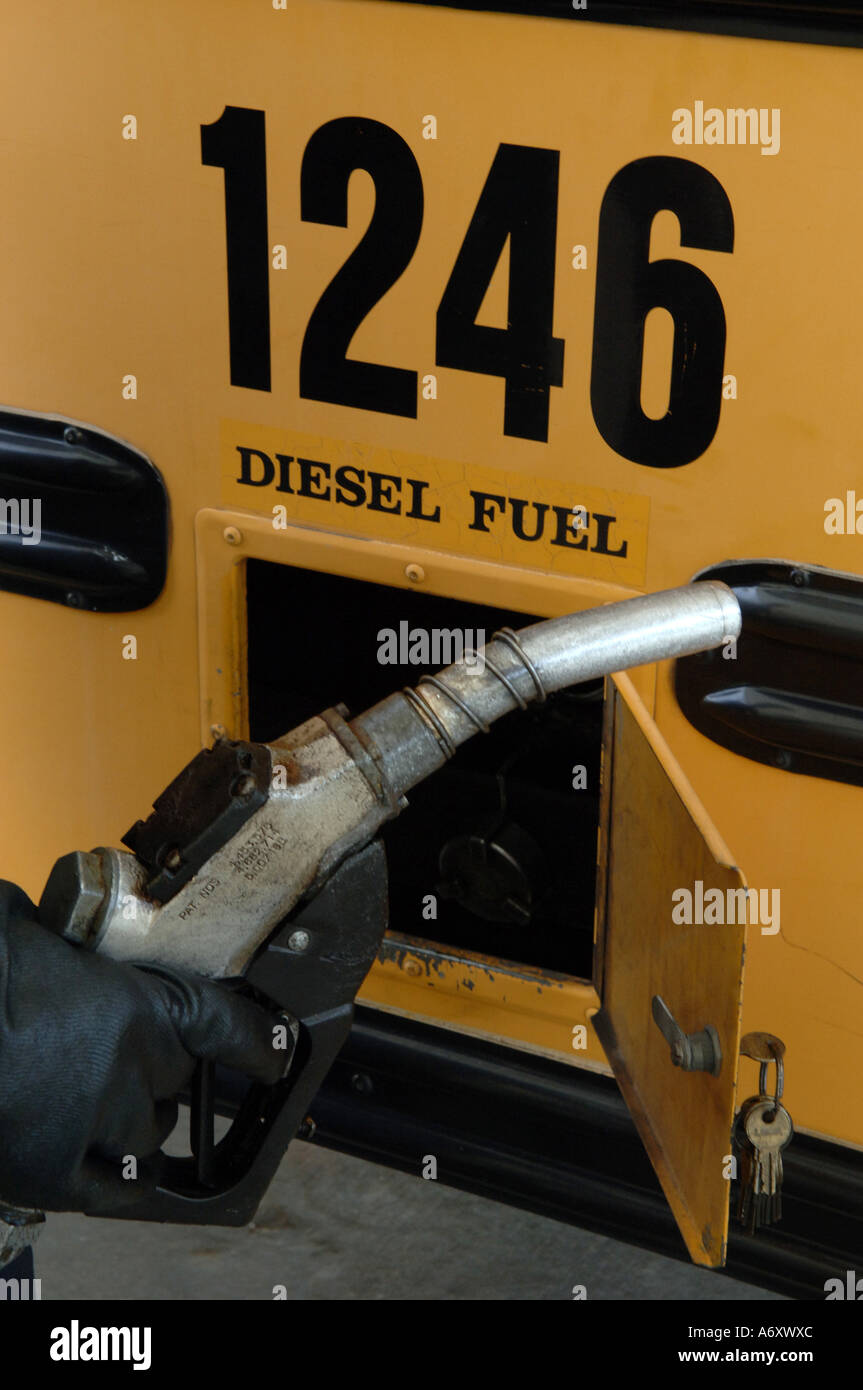 School system employee fuels a diesel powered school bus Decatur GA ...