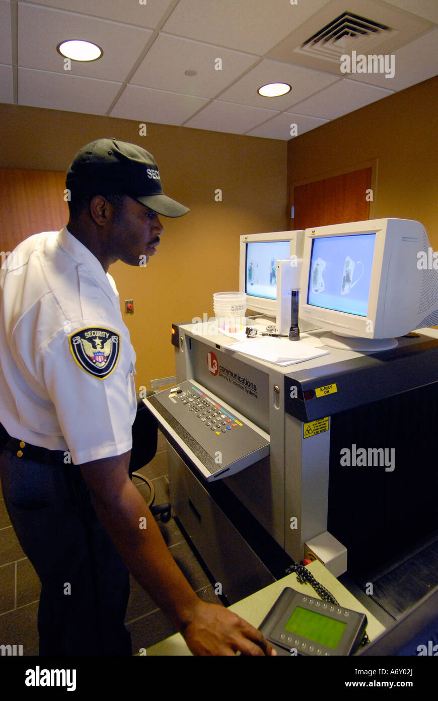 Person possession are screened and x rayed Stock Photo