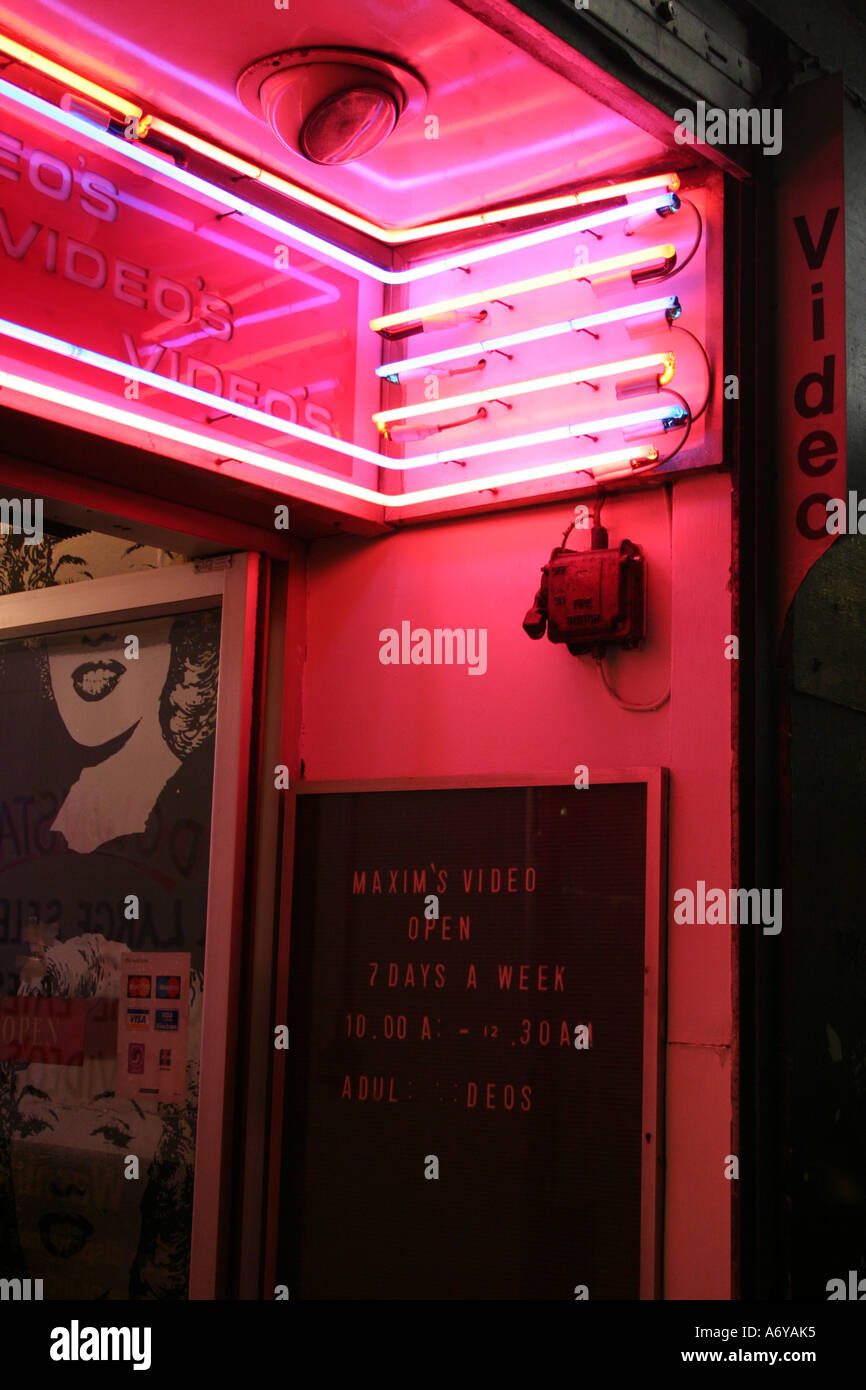 Pink Neon Sign at Adult Video Store Stock Photo - Alamy