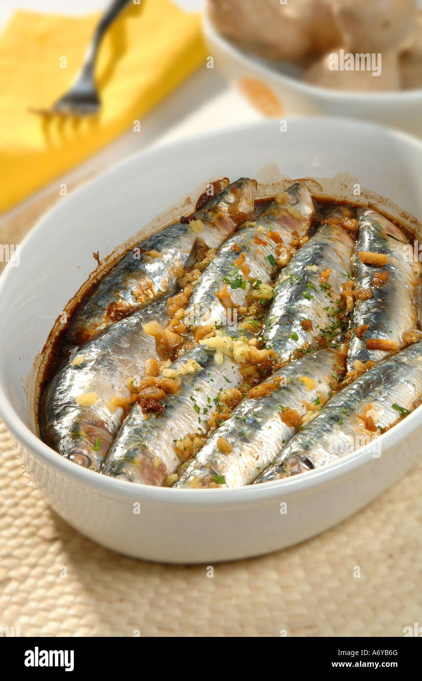 Baked young sardines with ginger Stock Photo Alamy