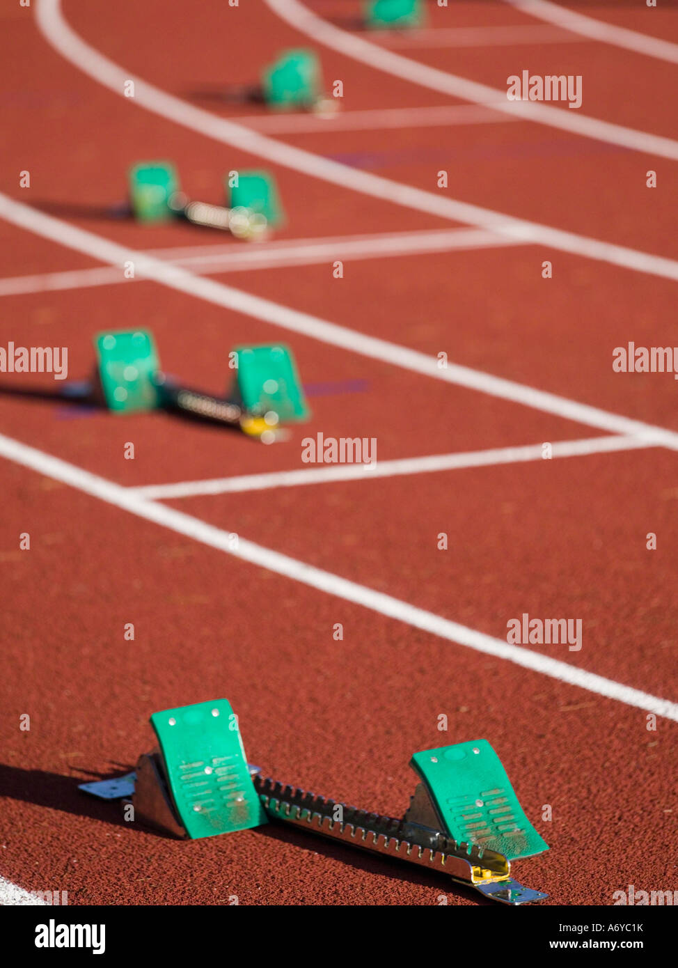 Starting blocks positioned on a running track Stock Photo Alamy
