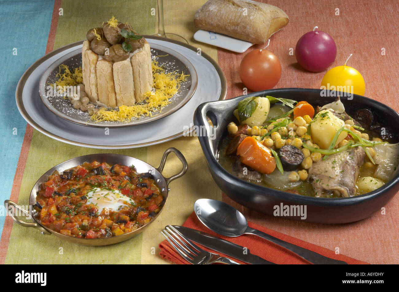 Menu of chickpea stew with beef egg casserole with vegetables and marron glacé charlotte Stock Photo