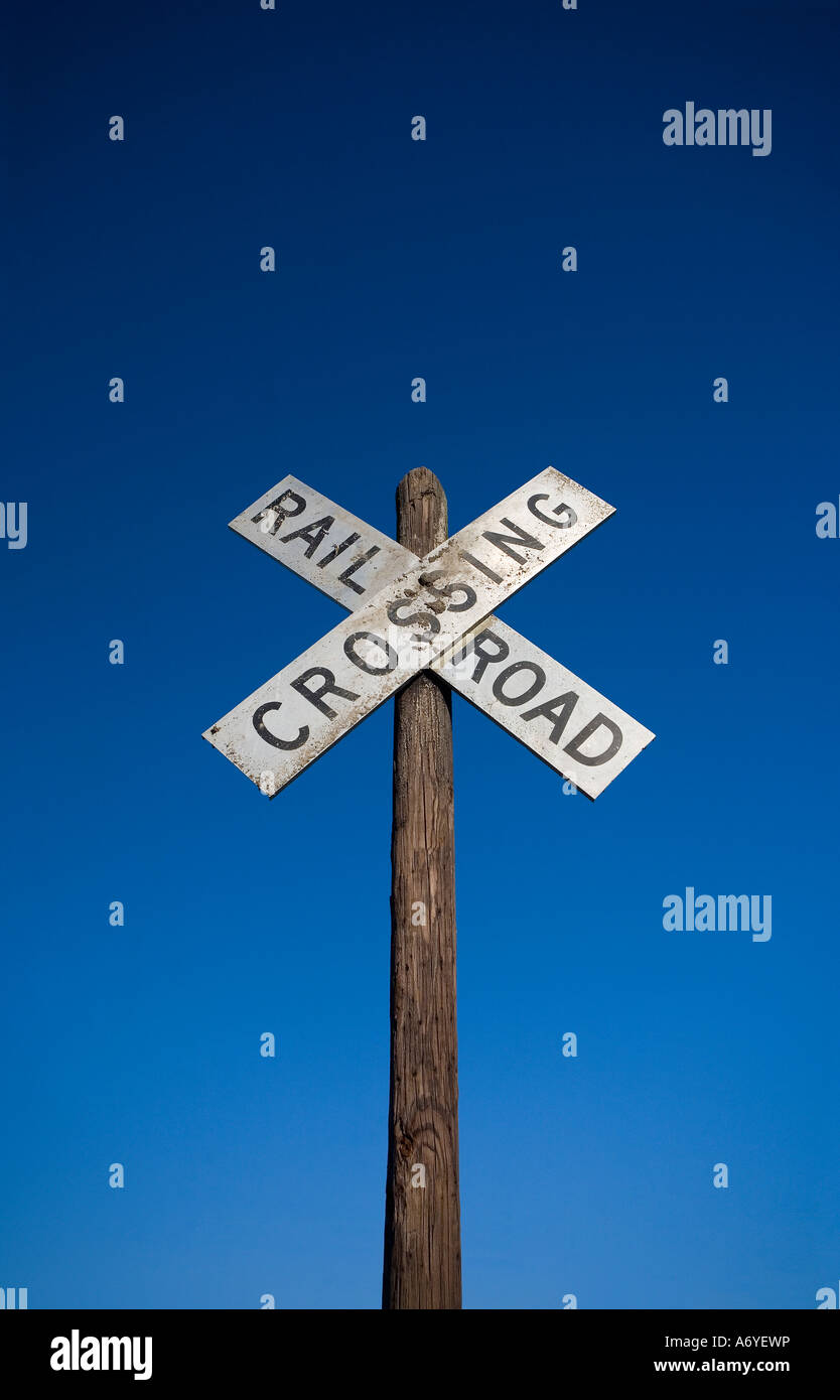 Railroad crossing signal post Stock Photo