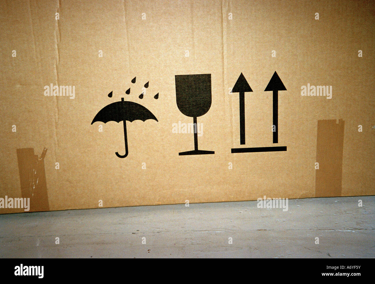 Symbols on a cardboard box Stock Photo - Alamy