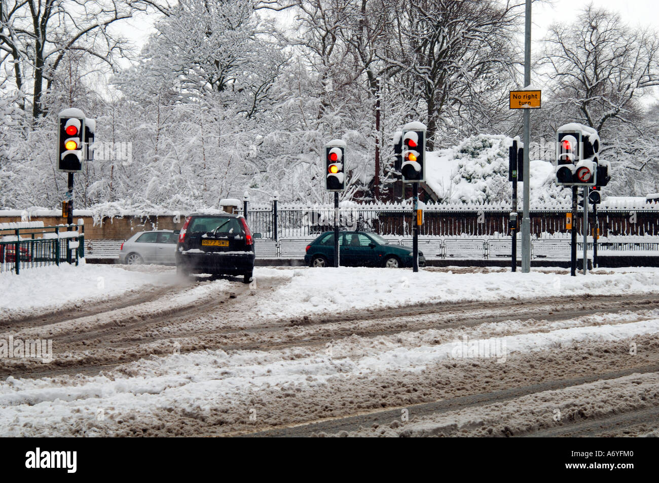 car driving in hazardous winter conditions springtime Scotland Stock ...