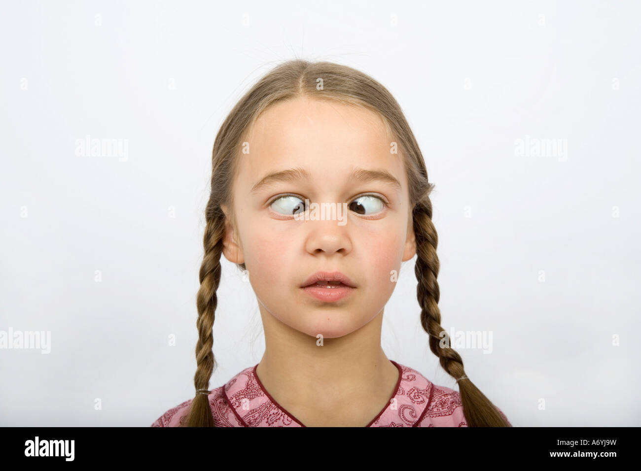 A girl crossing her eyes Stock Photo Alamy