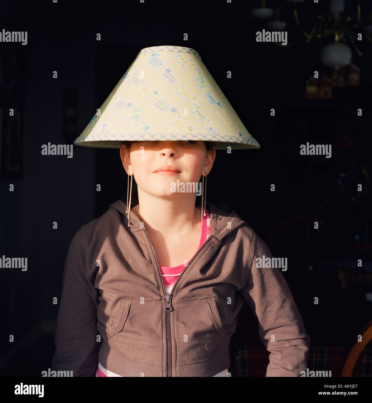 Girl wearing a lampshade on her head Stock Photo Alamy