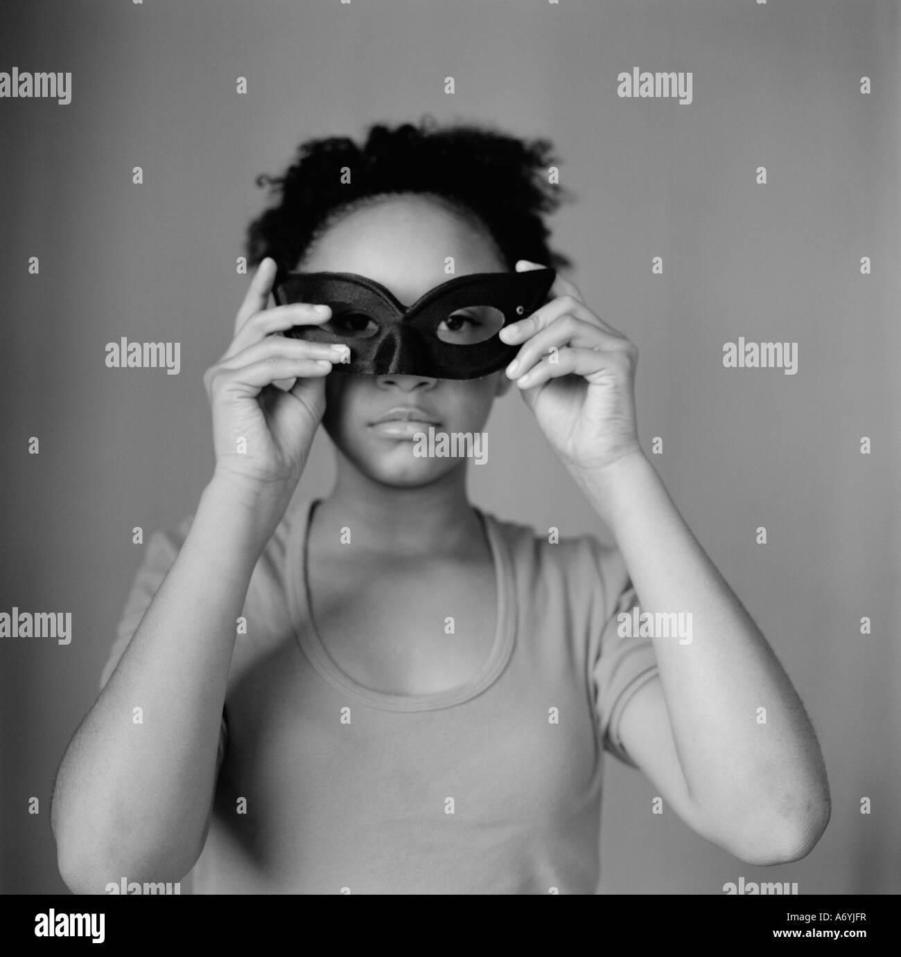 Holding mask Black and White Stock Photos & Images - Alamy