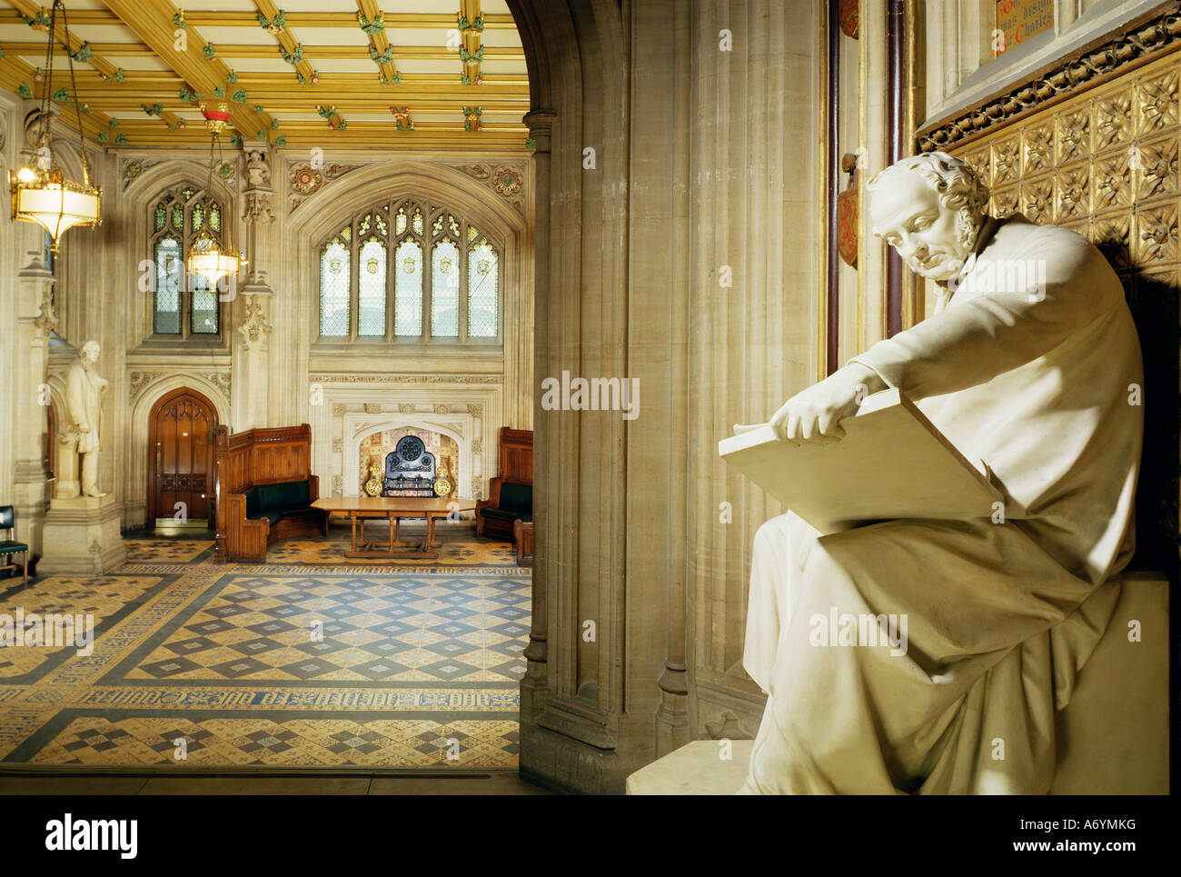Lower waiting hall with statue of the architect Barry House of Commons Houses of Parliament Westminster London England Uni Stock Photo