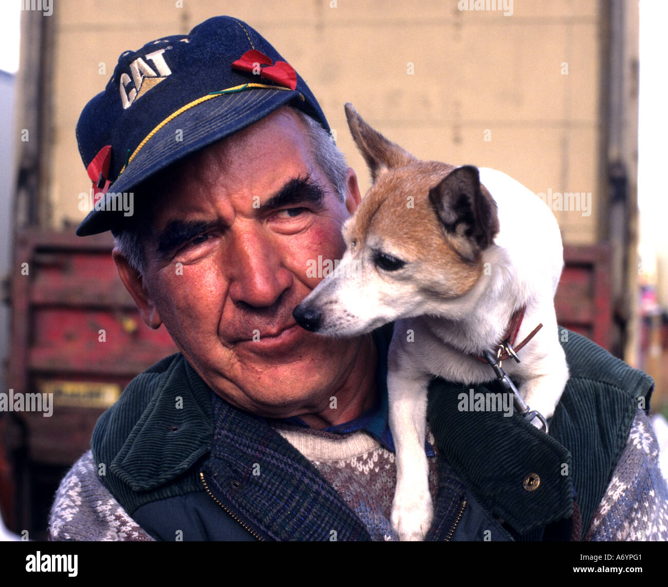 elderly man with little dog old love England Stock Photo
