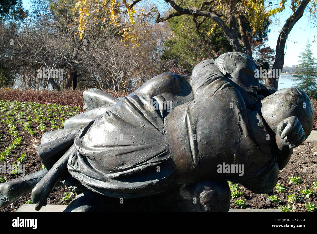 Statues of a man kissing a woman Stock Photo Alamy