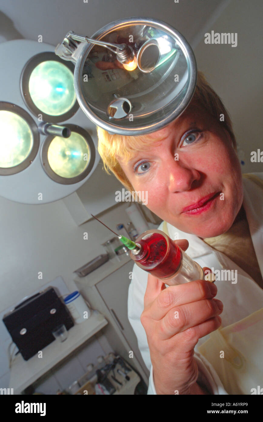 doctor with injection MR Stock Photo - Alamy