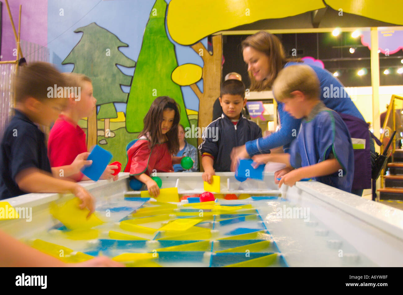 Children mother at water play activity at the Children s Museum CM2 ...
