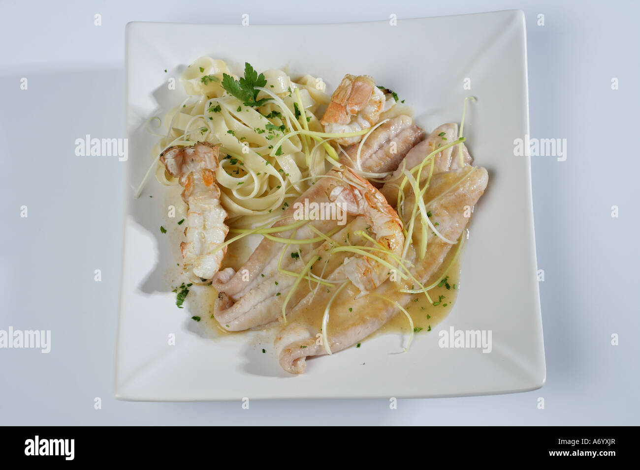 Sole fish with Dublin bay prawns zenithal view Stock Photo Alamy