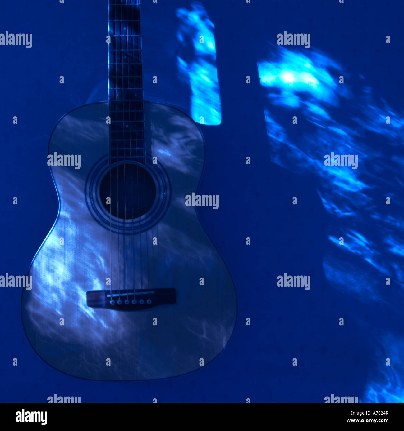 Moonlight blue guitar CD or album cover square format Stock Photo